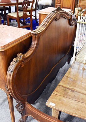 Lot 1245 - A French Walnut Carved Double Bed, late 19th...