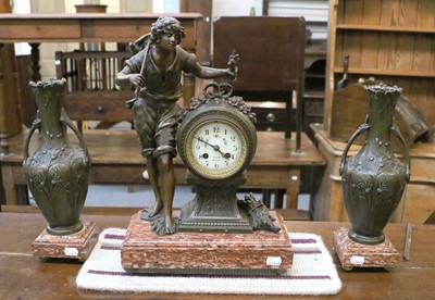 Lot 1391 - A French Spelter Figural Striking Mantel Clock...