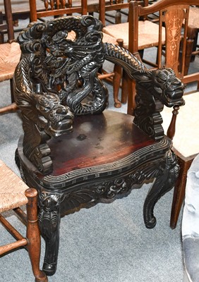 Lot 1331 - A Chinese Carved Hardwood Open Armchair