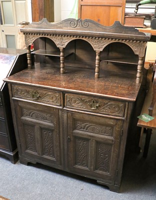 Lot 1409 - A Victorian Carved Oak Sideboard of small...