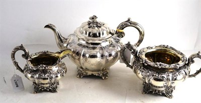Lot 11 - A matched three piece silver tea set