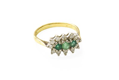 Lot 106 - An 18 carat Gold Emerald and Diamond Cluster...