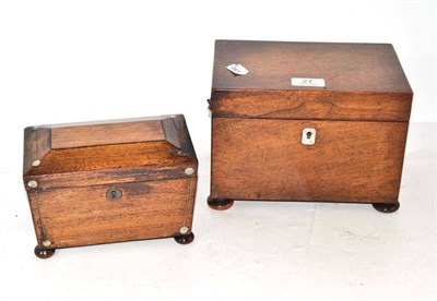 Lot 27 - An early Victorian two division tea caddy and a rosewood three division example (2)
