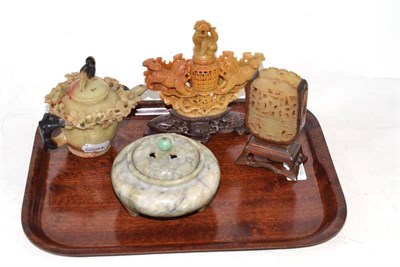 Lot 34 - A soapstone teapot and cover, a fo dog pot-pourri and cover, a carved and pierced match holder...