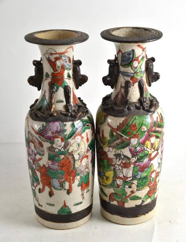 Lot 37 - A pair of late 19th century Chinese pottery vases, 29cm high