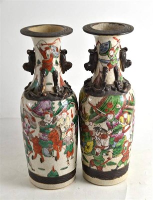 Lot 37 - A pair of late 19th century Chinese pottery vases, 29cm high