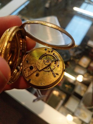 Lot 19 - A Lady's 18 Carat Gold Fob Watch