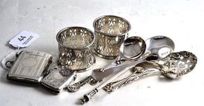 Lot 44 - Pair of silver napkin rings, two silver vestas and silver spoons