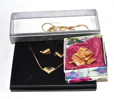 Lot 54 - A Dior necklace and pair of earrings, a Dior rose brooch and a Dior necklace