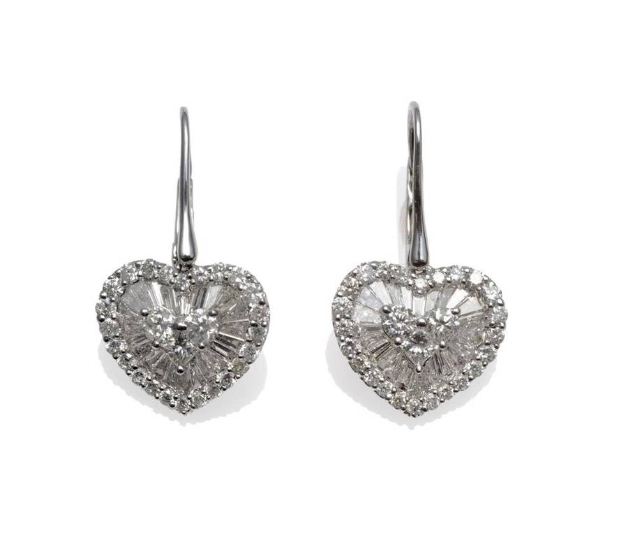 Lot 392 - A Pair of Heart Shaped Diamond Cluster Earrings, comprised of round brilliant cut and tapered...