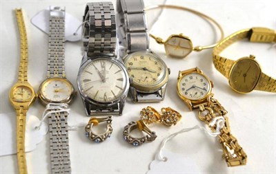Lot 69 - Two gentlemen's steel watches, five lady's watches and two pairs of clip earrings