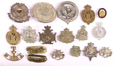 Lot 38 - A Collection of Eighteen Military Badges,...