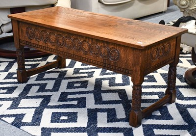 Lot 1271 - A Carved Oak Two Drawer Coffee Table, 106cm by...