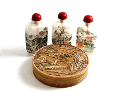 Lot 75 - Three Chinese inside painted snuff bottles and a carved soapstone Chinese circular box and...