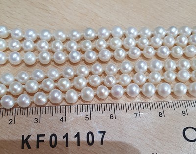 Lot 2022 - A Triple Row Cultured Pearl Necklace, with An...