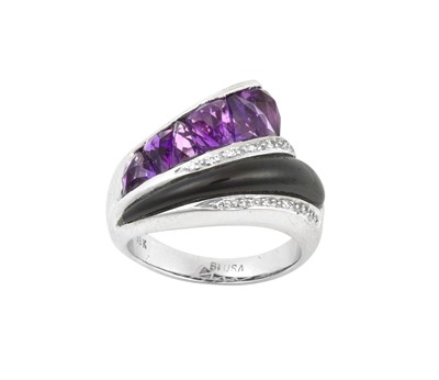 Lot 2051 - An Amethyst, Onyx and Diamond Ring, by...