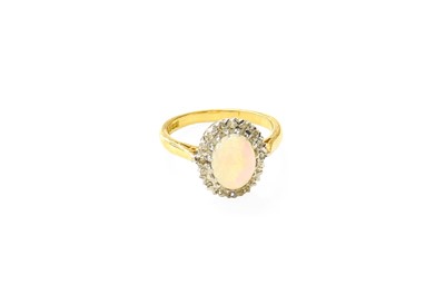 Lot 101 - An 18 Carat Gold Opal and Diamond Cluster Ring,...