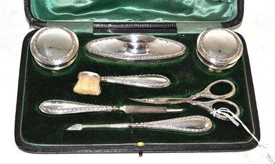 Lot 85 - A silver cased manicure set
