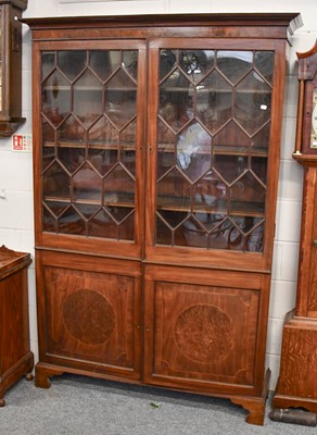 Lot 1195 - A Georgian Mahogany Glazed Bookcase, 141cm by...