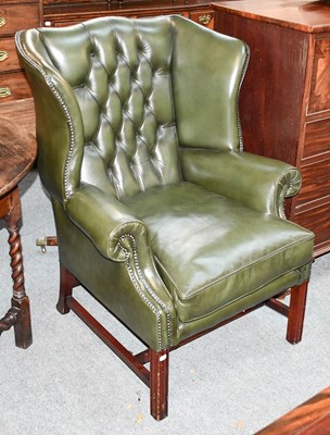 Lot 1448 - A George III Style Buttoned Green Back Armchair