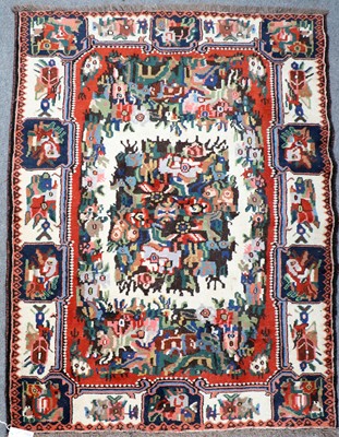 Lot 1109 - Bakhtiari Rug, the ivory field with central...