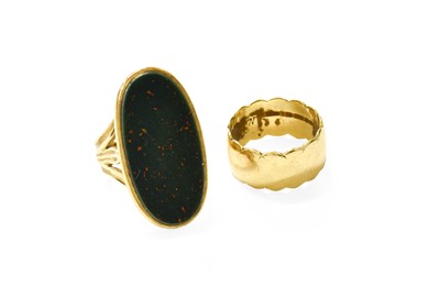 Lot 62 - A 9 Carat Gold Hardstone Ring, the oval...