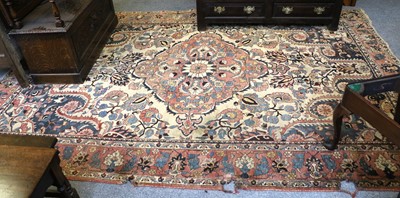 Lot 1120 - Bakhtiari Carpet, the ivory field with large...