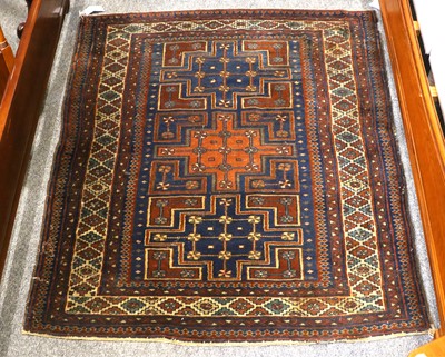 Lot 1124 - Durbend Rug, the indigo field with three...