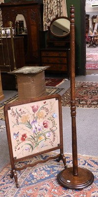 Lot 1234 - An Oak Firescreen with Floral Needlework Panel...