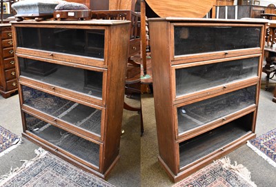 Lot 1294 - A Pair of 1930s Oak Four Tier Sectional...