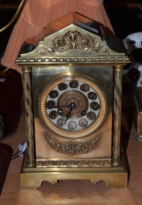 Lot 120 - A gilt brass striking mantel clock