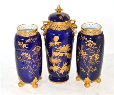 Lot 123 - A Royal Worcester blue ground and gilt decorated vase and cover, 29cm high; and a pair of blue...