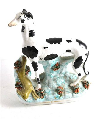 Lot 125 - Staffordshire coursing group with black and white greyhound
