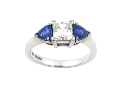 Lot 2311 - A Platinum Sapphire and Diamond Three Stone...