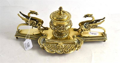 Lot 126 - A Victorian brass inkwell mounted with two griffins with jewelled eyes