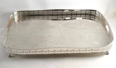 Lot 133 - A silver on copper twin handled tray, the plateau decorated with a Romany gypsy scene with...
