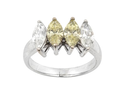 Lot 2261 - A Diamond Four Stone Ring two fancy yellow...