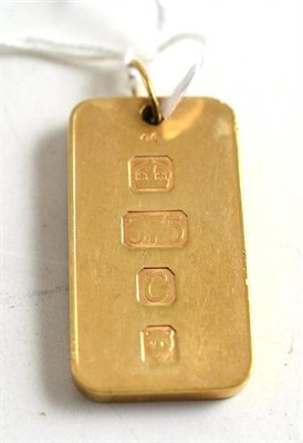 Lot 138 - A 9ct gold ingot