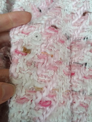 Lot 1099 - Chanel Boutique Pink and White Boucle Jacket,...