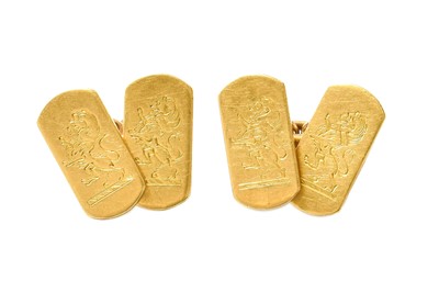Lot 11 - A Pair of 18 Carat Gold Cufflinks, the chain...