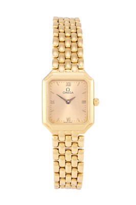 Lot 2437 - Omega: A Lady's 18 Carat Gold Wristwatch,...