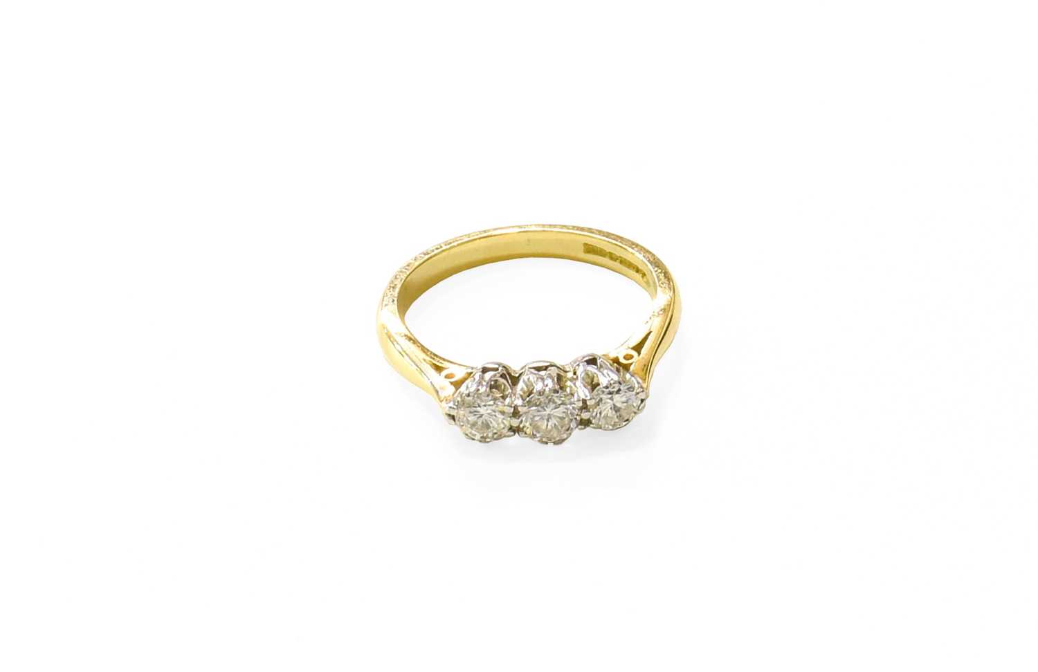 Lot 90 - A 18 Carat Gold Diamond Three Stone Ring, the...