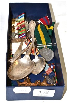 Lot 152 - Silver flatware and assorted WWII miniatures, badges, Territorial Force Efficiency medal awarded to