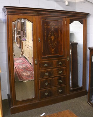 Lot 1238 - An Edwardian Mahogany Wardrobe, the central...