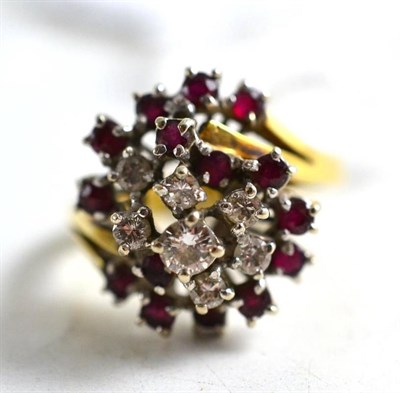 Lot 156 - An 18ct gold diamond and ruby cluster ring