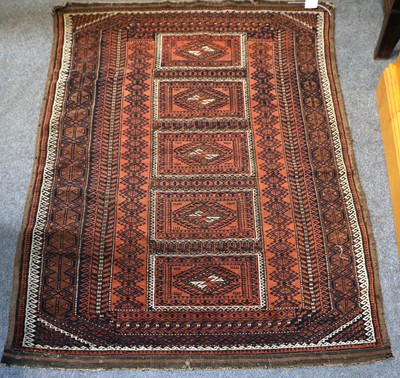 Lot 216 - Baluch Rug, the madder field with four panels...