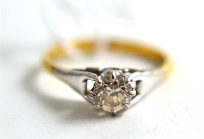 Lot 157 - A diamond solitaire ring, circa 1930, with a platinum fronted setting, 0.40 carat approximately