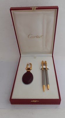 Lot 2239 - A Cased Must de Cartier Ball-Point Pen, Mechanical Pencil and Key-Ring