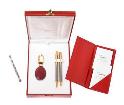 Lot 2239 - A Cased Must de Cartier Ball-Point Pen, Mechanical Pencil and Key-Ring