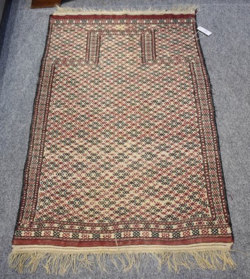 Lot 1016 - Turkmen Flatweave Prayer Rug, the ivory...